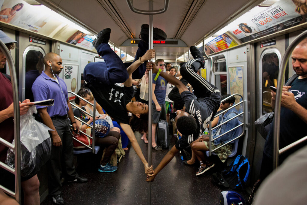 image of subway dancers on the NYC L Train